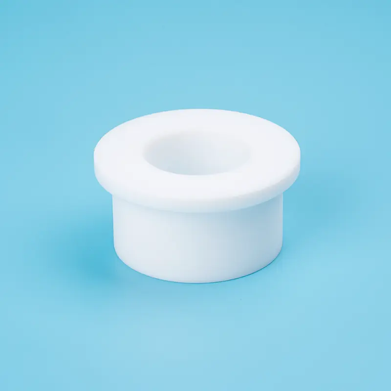 PTFE-fodrad bussning